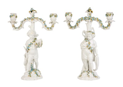 Lot 771 - A pair of German porcelain figural candelabra, circa 1900.