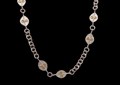 Lot 106 - GUY ROYLE - A silver and yellow metal applied necklace.