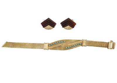 Lot 325 - CHRISTIAN DIOR - A vintage gold plated turquoise set bracelet and a pair of clip earrings.