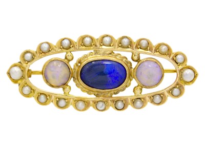 Lot 84 - A 9ct oval openwork brooch set with moonstone, blue opal and pearls.