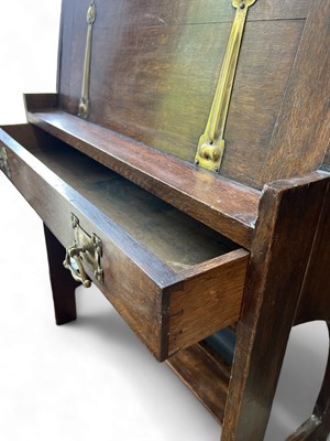 Lot 1552 - An Arts and Crafts oak student bureau.