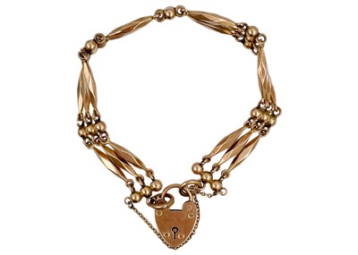 Lot 105 - A 9ct rose gold fancy gate link bracelet with padlock clasp.