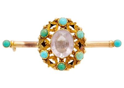 Lot 114 - A Victorian turquoise and amethyst set gold bar brooch.