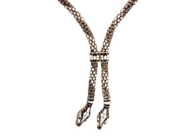 Lot 125 - An unusual German Art Deco silver and white enamel double snake articulated necklace.