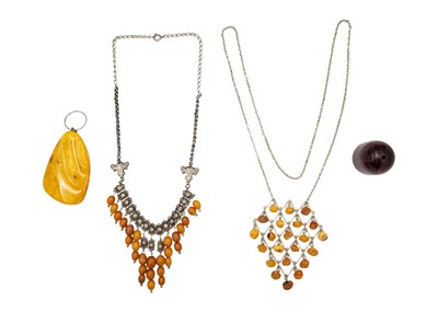 Lot 273 - A selection of amber jewels.