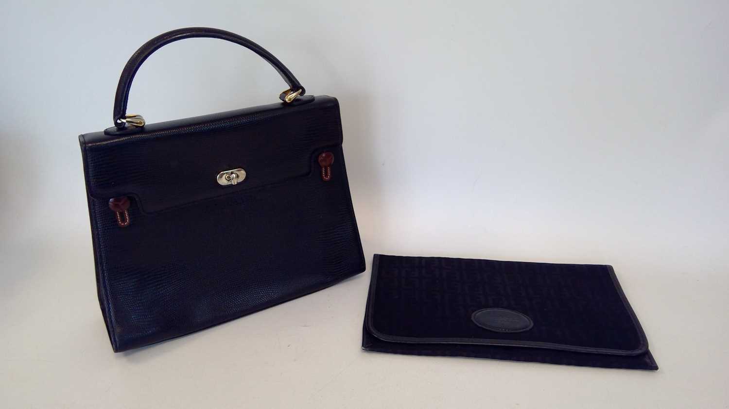 Lot 77 - A Louis Feraud clutch bag and a Didier