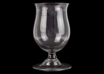 Lot 1261 - A George III baluster glass leech jar.