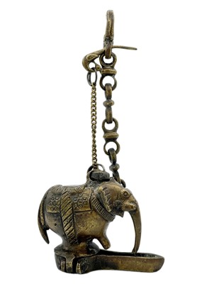 Lot 312 - An Indian bronze hanging lamp in the form of an elephant.