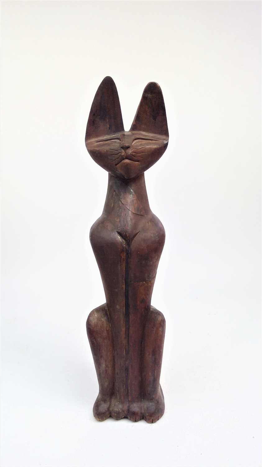 Lot 41 - A large carved wood sculpture of a seated cat....