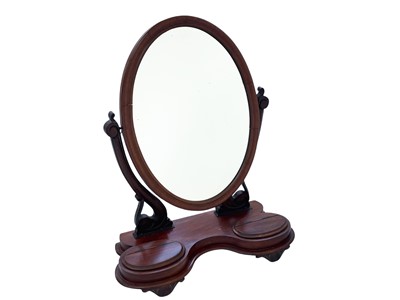 Lot 340A - An early 20th century mahogany frame oval toilet mirror.