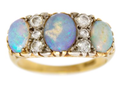 Lot 152 - An 18ct diamond and blue opal set ring