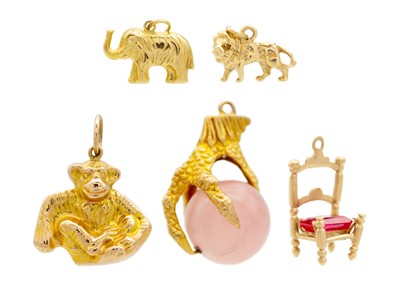 Lot 165 - A selection of five 9ct charms.