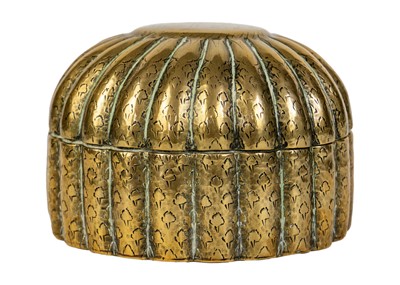 Lot 330 - A Mughal brass betel box, North India, 18th century.