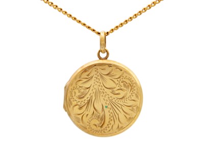 Lot 171 - A 9ct foliate engraved locket pendant on yellow metal curb link necklace.