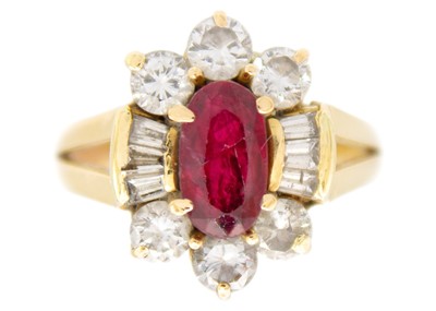 Lot 172 - A modern Chinese 18ct ruby and diamond cluster ring.