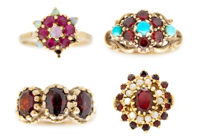 Lot 186 - A selection of four 9ct garnet and gem set rings.