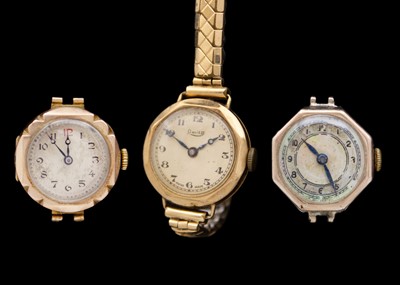 Lot 165 - A selection of three 9ct cased lady's manual wind wristwatches and a broken 9ct bracelet.