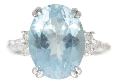 Lot 167 - An 18ct white gold aquamarine and diamond set ring.