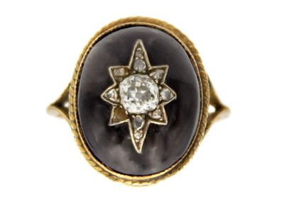 Lot 234 - A Victorian garnet cabochon and diamond set gold ring.