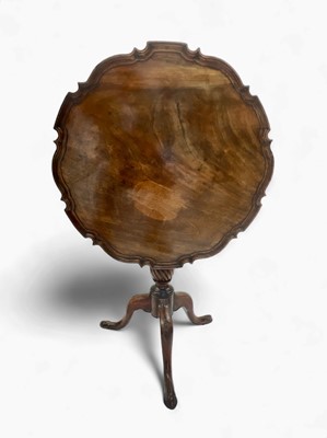 Lot 1024 - A mid 18th-century tripod table