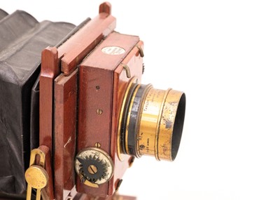 Lot 68 - A Thornton Picard plate camera and tripod.