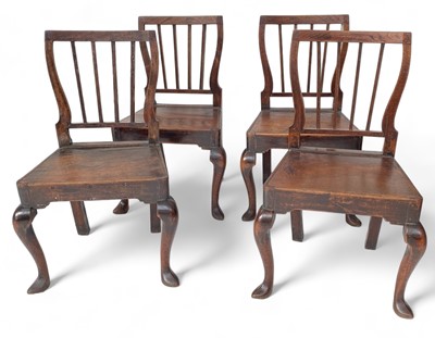 Lot 1038 - A set of four George III regional chairs