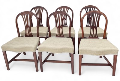 Lot 1698 - A set of six George III period mahogany dining chairs.