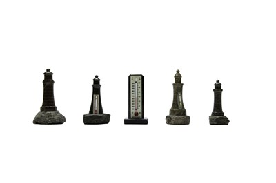Lot 1380 - A collection of Cornish serpentine turned lighthouses.
