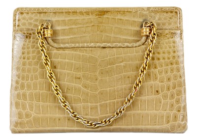 Lot 338 - A Gucci crocodile handbag with chain handles.