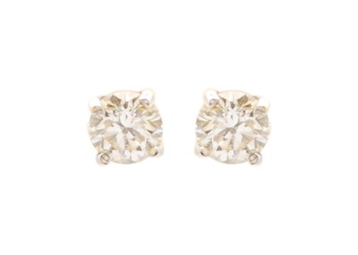 Lot 43 - A pair of 0.66ct diamond ear studs set in 18ct yellow and white gold.