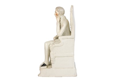 Lot 721 - A Victorian Staffordshire flatback figure of a seated Wellington.