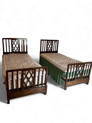 Lot 911 - A pair of Heals single beds and mattresses