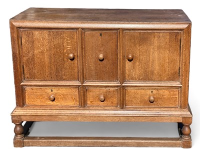 Lot 418 - A Heals light oak sideboard.