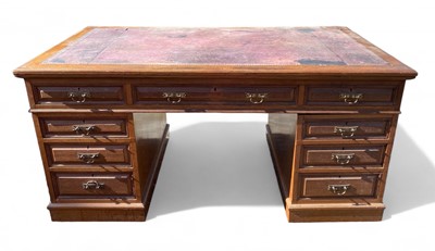 Lot 971 - An early 20th century oak pedestal desk.