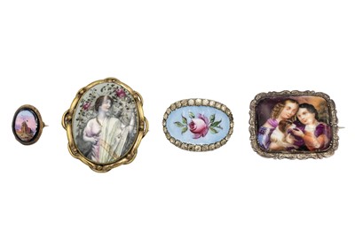 Lot 285 - A selection of three Victorian porcelain brooches and an enamel paste set shoe buckle.