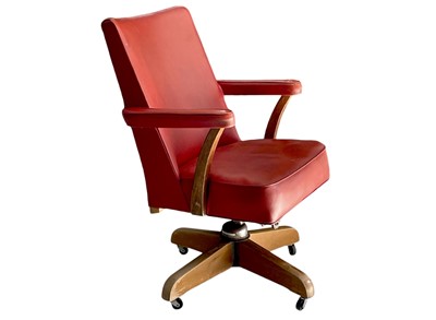 Lot 419 - A Hillcrest red leather swivel desk chair.