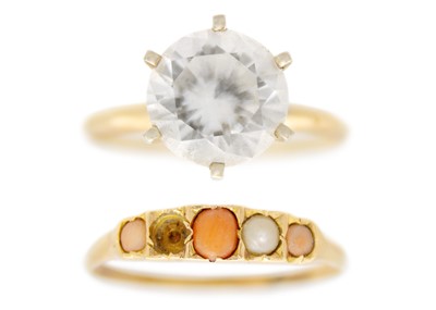 Lot 238 - An antique 15ct coral and pearl set five stone ring and a 14ct cz set cocktail ring.