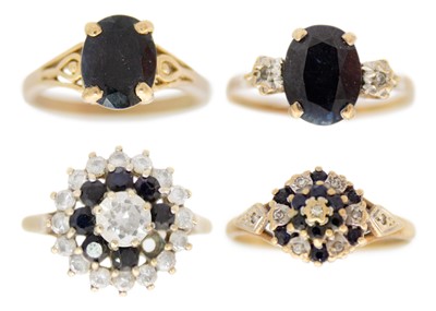 Lot 231 - Four 9ct sapphire set rings.