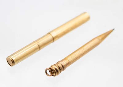 Lot 272 - A Nupoint gold-filled fob dip pen and propelling pencil within fitted case.