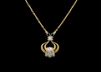 Lot 196 - An 18ct (tested) yellow and white gold diamond set pendant necklace.