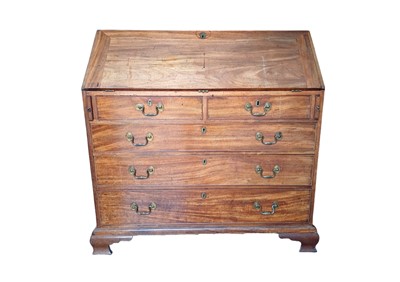 Lot 661 - A George III mahogany bureau.