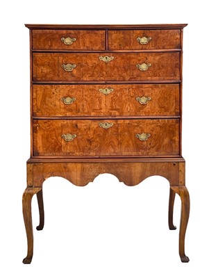 Lot 1008 - A George II walnut and crossbanded chest on stand.