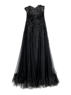 Lot 329 - A black silk, sequined black mesh full length strapless evening dress.