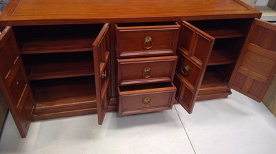 Lot 39 - A Large, Hardwood Sideboard. The Sideboard...