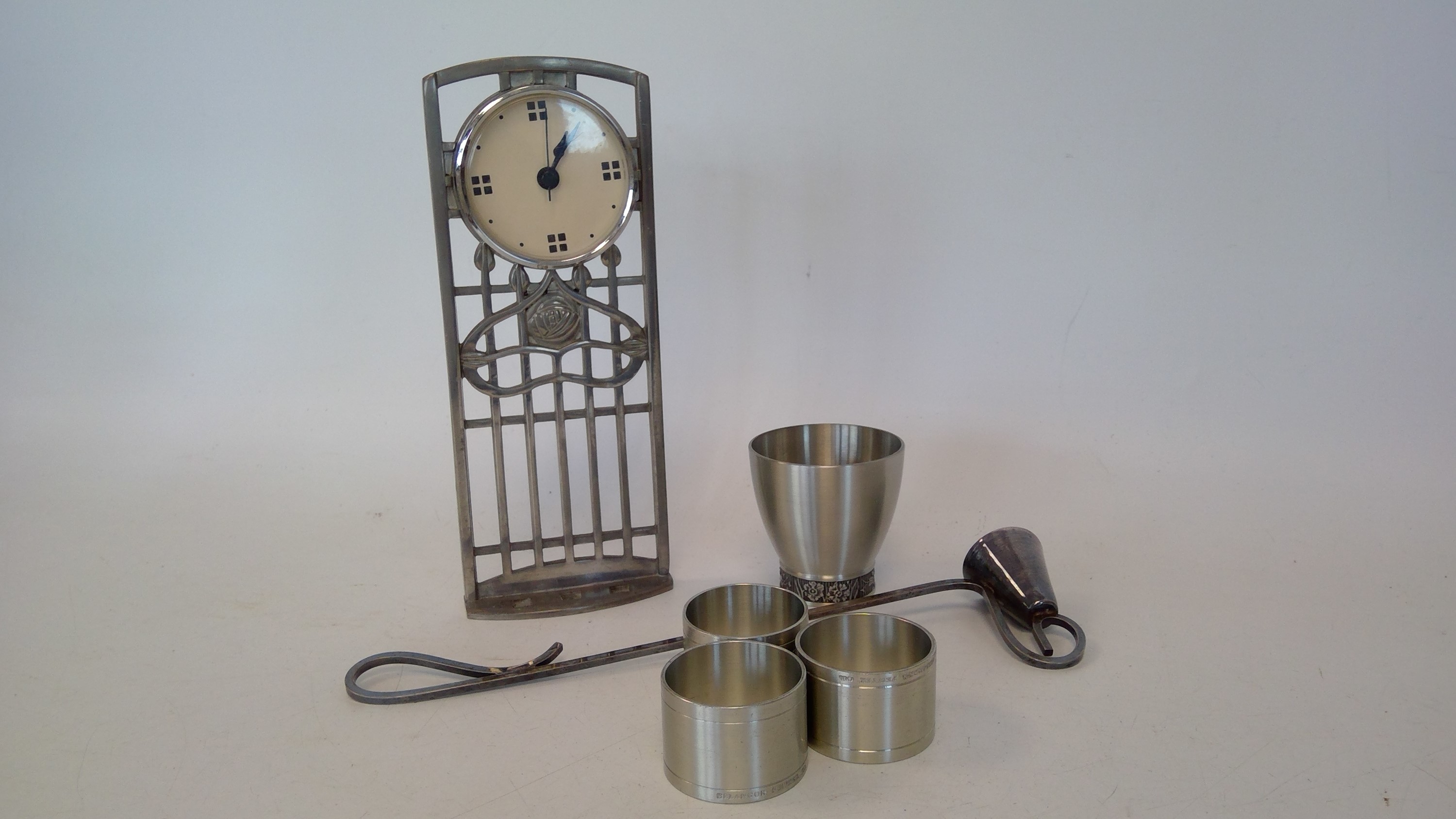 Lot 38 - A Charles Rennie Mackintosh pewter clock