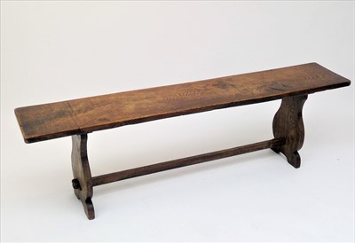 Lot 3532 - An elm bench, 20th century, height 46cm, width...