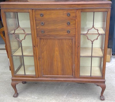 Lot 23 - A Walnut Display Cabinet. With Ball and Claw...