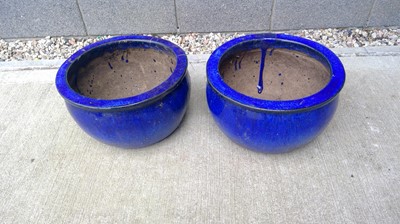 Lot 47 - Two 16" diameter, Dark Blue Ceramic Planters.