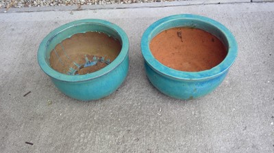 Lot 43 - Two, 15" diameter Turquoise Plant Pots.