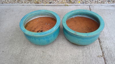 Lot 42 - Two Turquoise, 15" diameter Plant Pots.